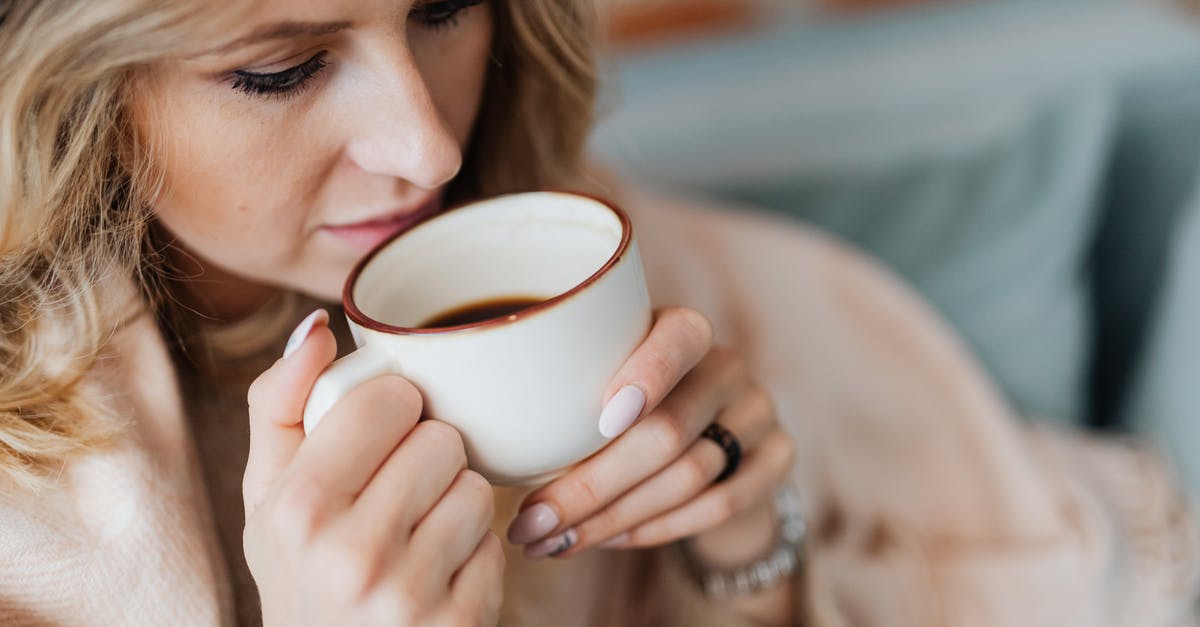What is the definition of a cup of coffee - Woman Drinking Coffee What is the definition of a cup of coffee - Woman Drinking Coffee