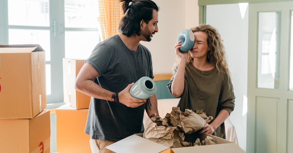 What is the difference between all these flat breads? [closed] - Multiethnic couple with ceramic vases and pile of cardboard boxes