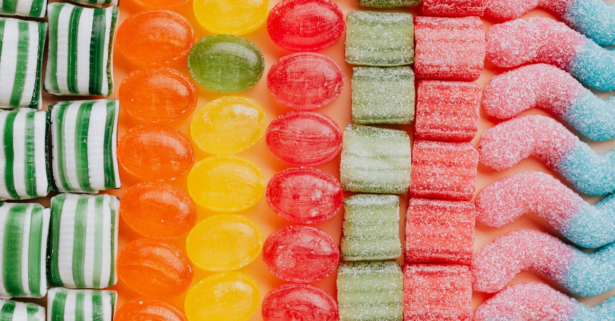 What is the difference between butterscotch, caramel, and toffee? - Set of delicious jelly and caramel sweets arranged in lines by type What is the difference between butterscotch, caramel, and toffee? - Set of delicious jelly and caramel sweets arranged in lines by type