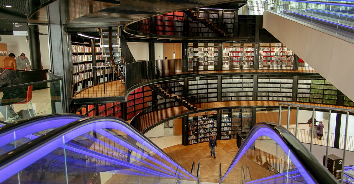 What is the difference between Clam Chowder and New England style? - Escalator in modern public library