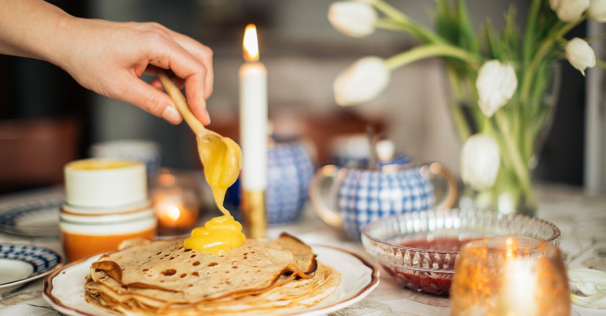 What is the difference between custard pie and custard tart? - Person Filling Crepe with Custard What is the difference between custard pie and custard tart? - Person Filling Crepe with Custard