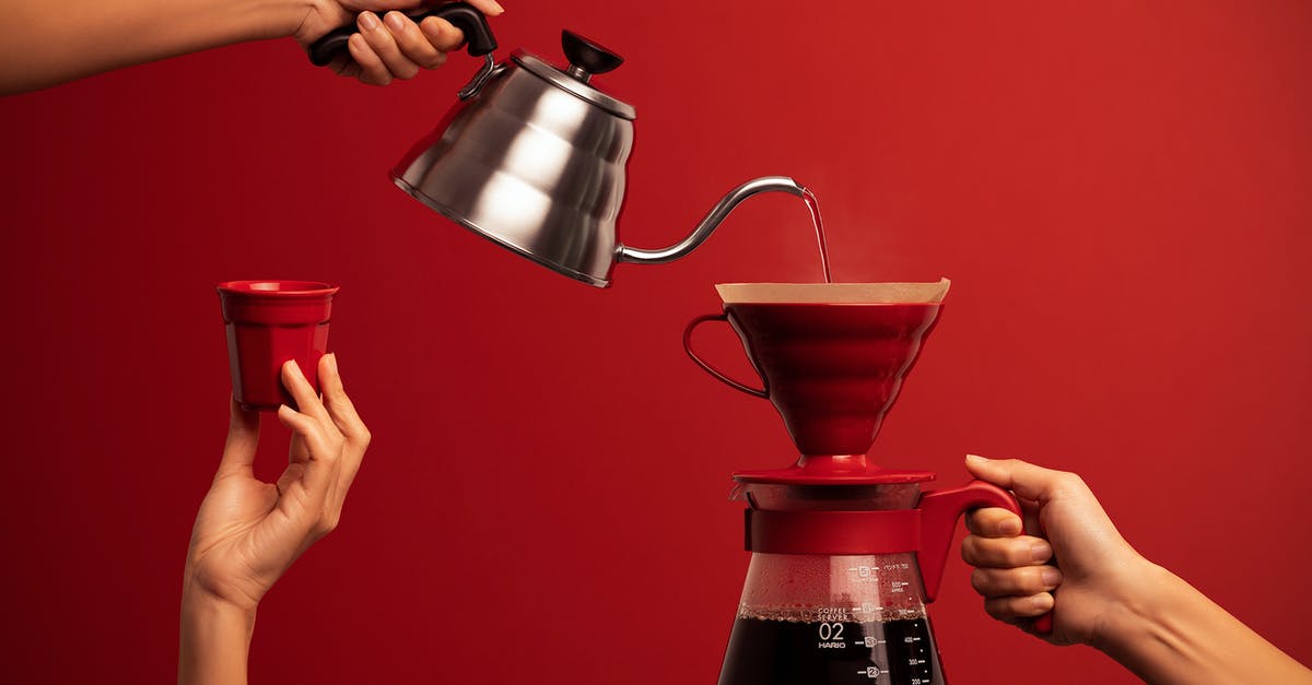 What is the difference between instant and filter coffee? - a Person Pouring Hot Water on a Coffee Dispenser What is the difference between instant and filter coffee? - a Person Pouring Hot Water on a Coffee Dispenser