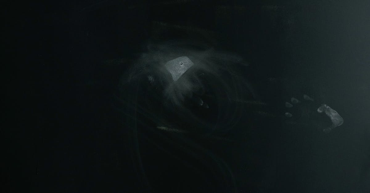 What is the difference between light and dark soy sauce? - Abstract dark background with human hand trace What is the difference between light and dark soy sauce? - Abstract dark background with human hand trace