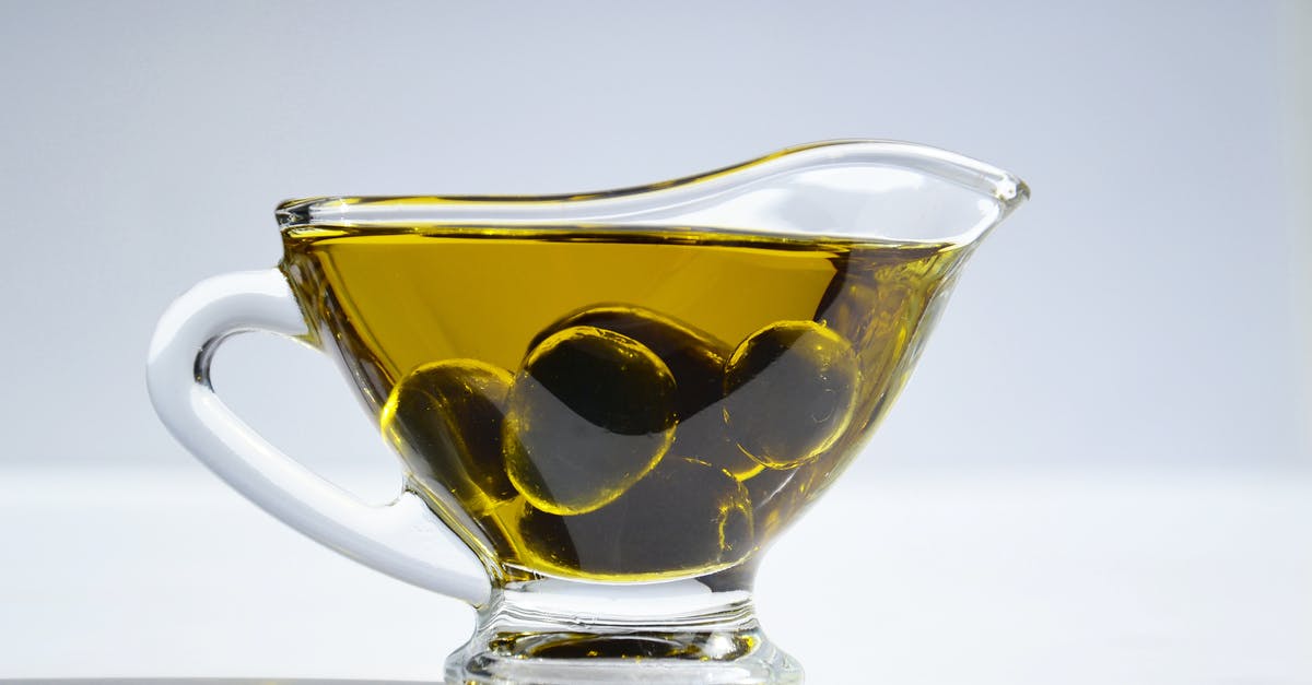 What is the difference between normal oils and cooking oils? - Photo of Olives on Cup of Olive Oil What is the difference between normal oils and cooking oils? - Photo of Olives on Cup of Olive Oil