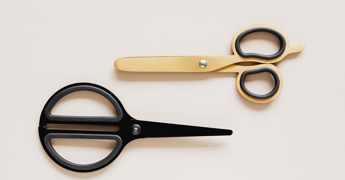 What is the difference between various cuts of steak? - Top view of multicolored scissors of different shape on beige table What is the difference between various cuts of steak? - Top view of multicolored scissors of different shape on beige table