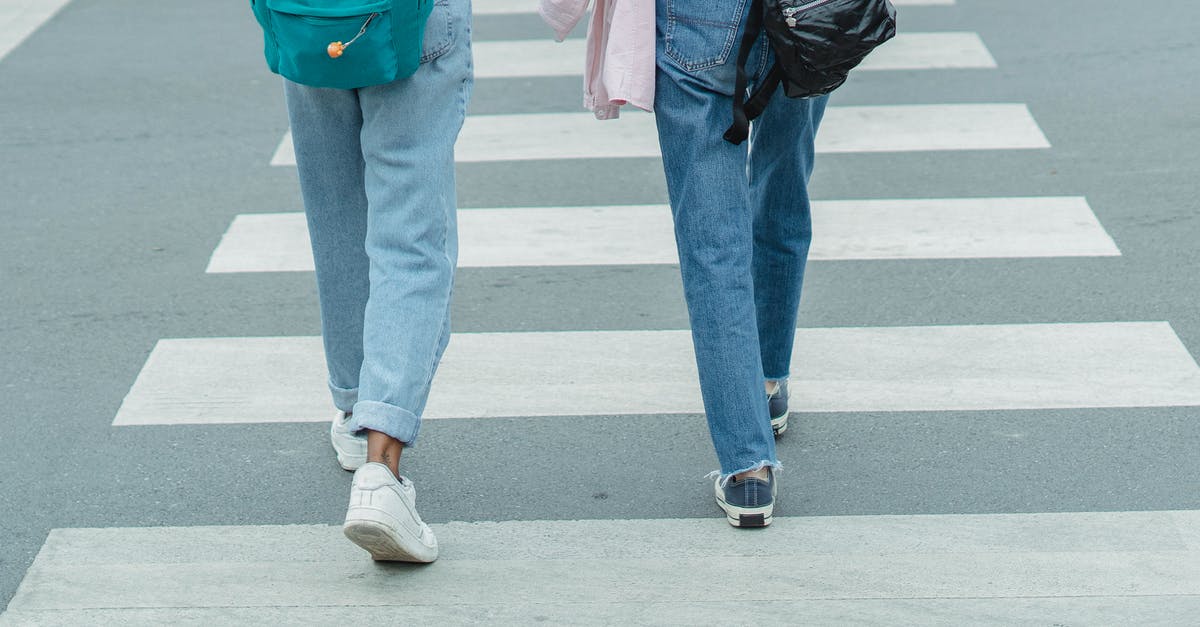 What is the easiest way to remove chicken leg/drumstick tendons? - Unrecognizable women wearing jeans crossing city street What is the easiest way to remove chicken leg/drumstick tendons? - Unrecognizable women wearing jeans crossing city street