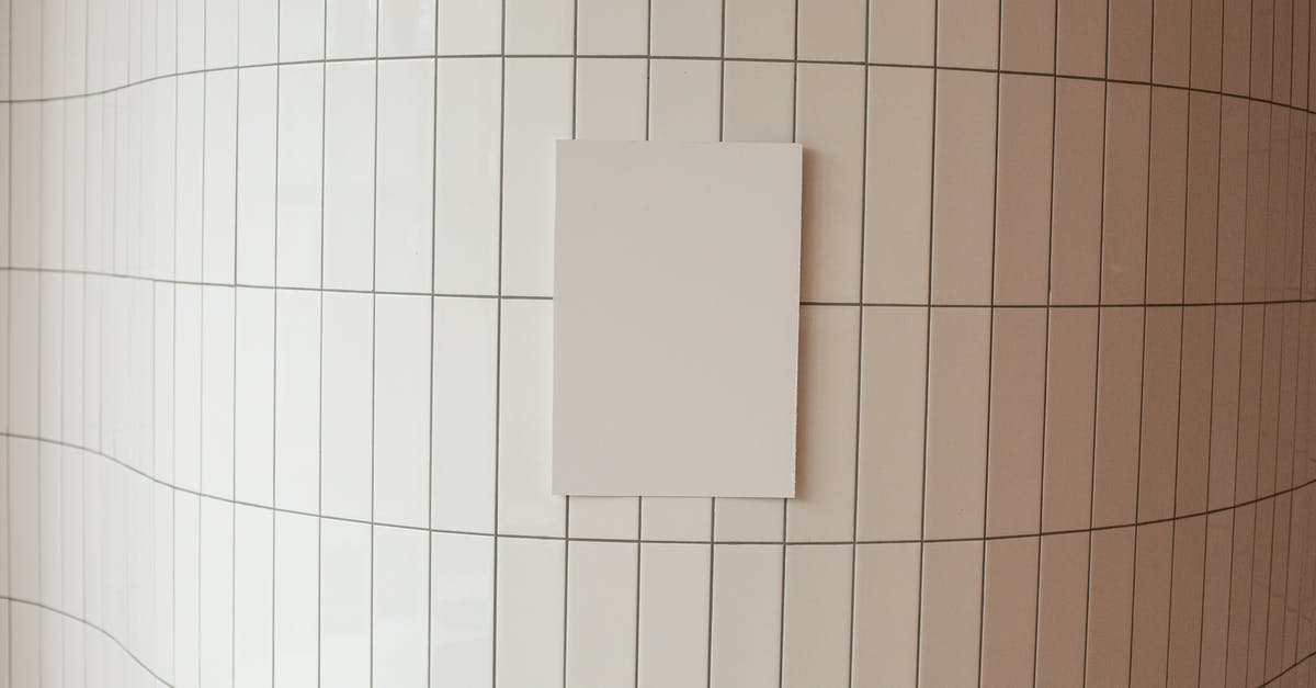 What is the inside texture of a Japanese croquette? - White canvas on tile wall in room What is the inside texture of a Japanese croquette? - White canvas on tile wall in room