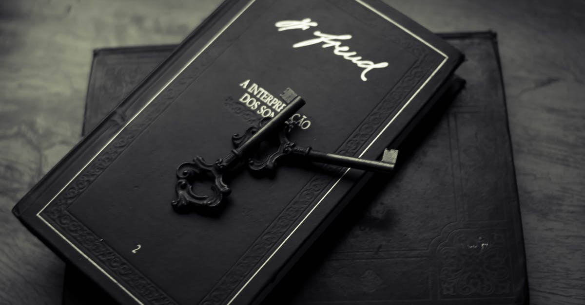 What is the Key Difference Between Nougat and Meringue? - From above of classic metal key placed on black books on wooden table What is the Key Difference Between Nougat and Meringue? - From above of classic metal key placed on black books on wooden table