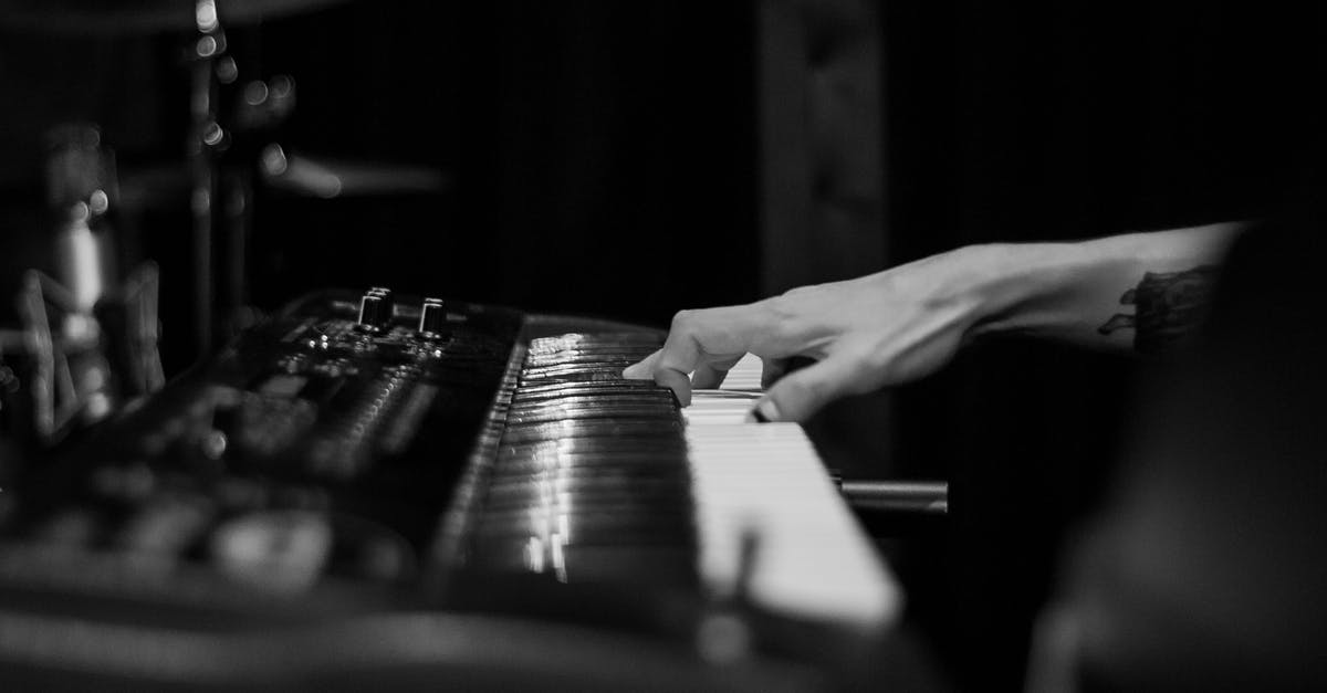 What is the key to a shiny crumb in bread? - Black and white of crop anonymous tattooed musician playing chord on synthesizer with sound board What is the key to a shiny crumb in bread? - Black and white of crop anonymous tattooed musician playing chord on synthesizer with sound board