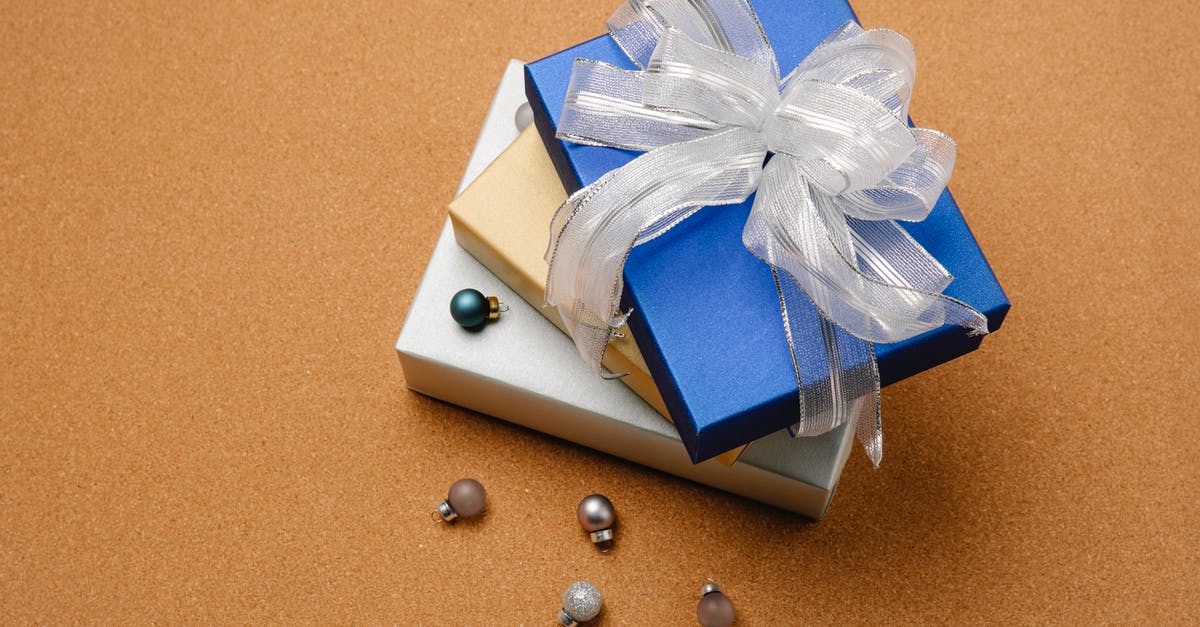 What is the magic in packaged pudding mixes? - Christmas gift boxes and baubles on table What is the magic in packaged pudding mixes? - Christmas gift boxes and baubles on table