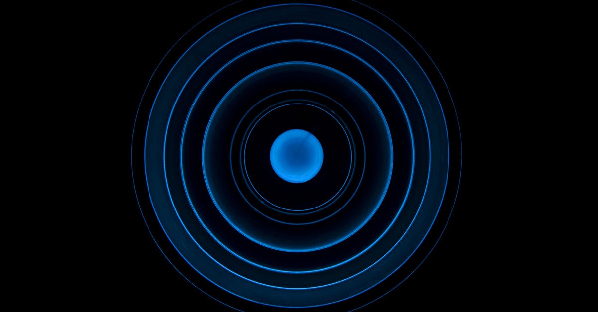 What is the meaning of a circle on induction cooktop? - Low Angle View of Spiral Staircase Against Black Background What is the meaning of a circle on induction cooktop? - Low Angle View of Spiral Staircase Against Black Background