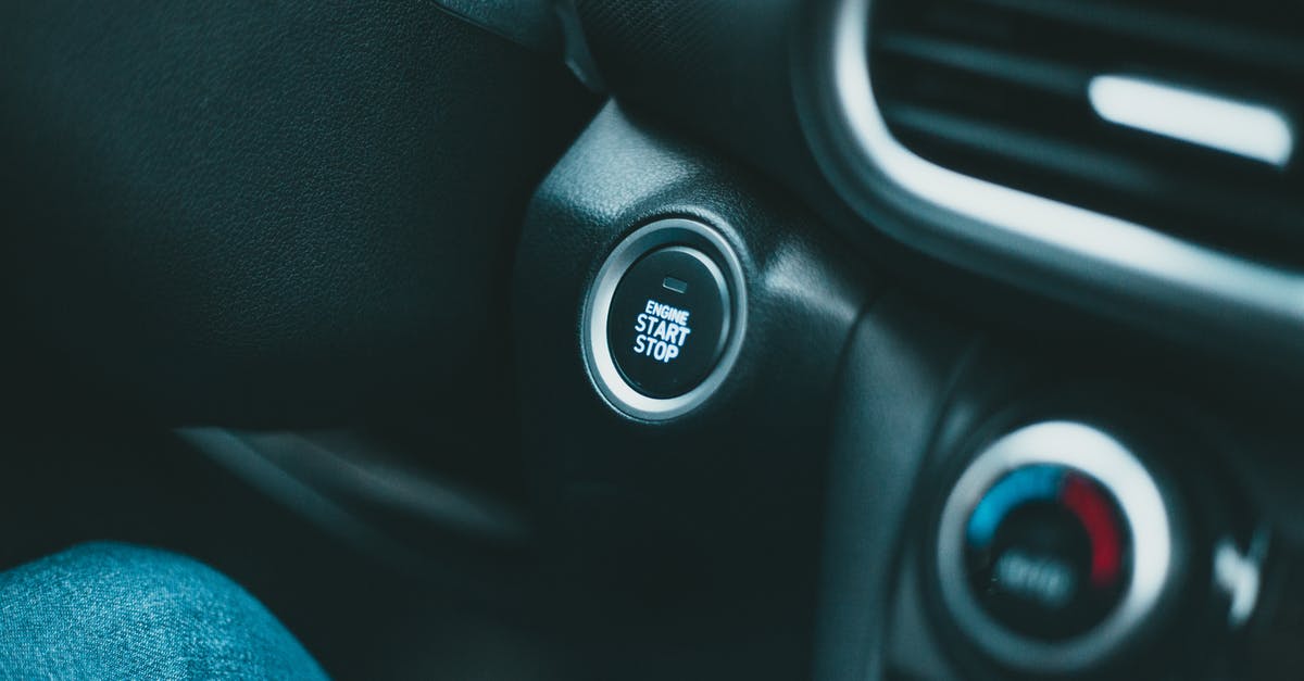 What is the most comfort temperature for tea? - Closeup of black shiny dashboard with engine start button and conditioner controller of modern car in daylight What is the most comfort temperature for tea? - Closeup of black shiny dashboard with engine start button and conditioner controller of modern car in daylight