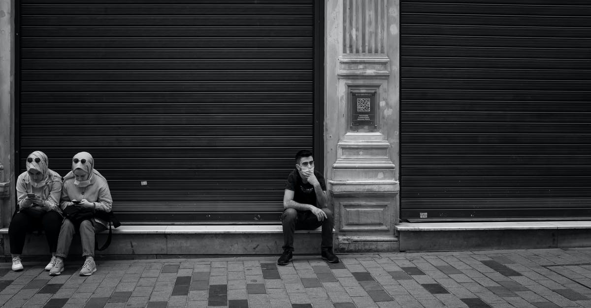 What is the most humane way to kill crayfish at home? - Black and white shot of aged building with column and people sitting near entrance door in city street What is the most humane way to kill crayfish at home? - Black and white shot of aged building with column and people sitting near entrance door in city street