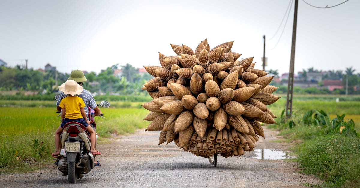 What is the proper way to brine fish? - People driving motorcycle near bicycle with bamboo fish traps in countryside What is the proper way to brine fish? - People driving motorcycle near bicycle with bamboo fish traps in countryside