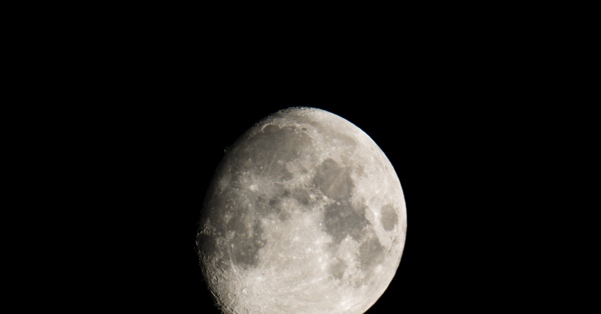 What is the science behind Magic Cake? - Black and white of grey craters on surface of big bright round glowing waxing Moon on black background What is the science behind Magic Cake? - Black and white of grey craters on surface of big bright round glowing waxing Moon on black background