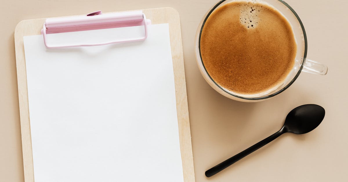 What is the setting for the strongest brew on my coffee maker? - Delicious hot coffee and clipboard on beige surface What is the setting for the strongest brew on my coffee maker? - Delicious hot coffee and clipboard on beige surface