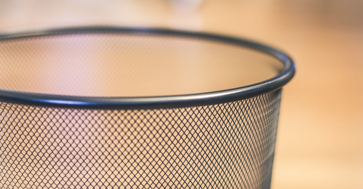 What is this grilling utensil with two wire mesh panels? - Gray Metal Mesh Cup What is this grilling utensil with two wire mesh panels? - Gray Metal Mesh Cup