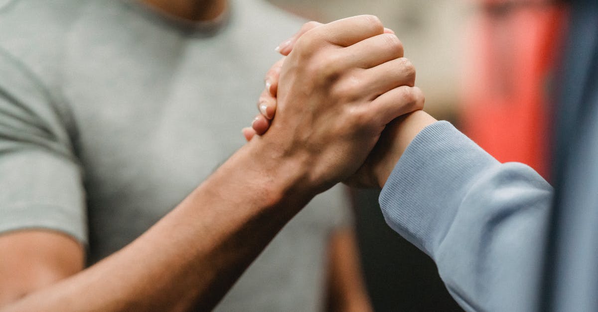 What is this sauce-making technique called? - Crop sportive couple clasping hands in gym What is this sauce-making technique called? - Crop sportive couple clasping hands in gym