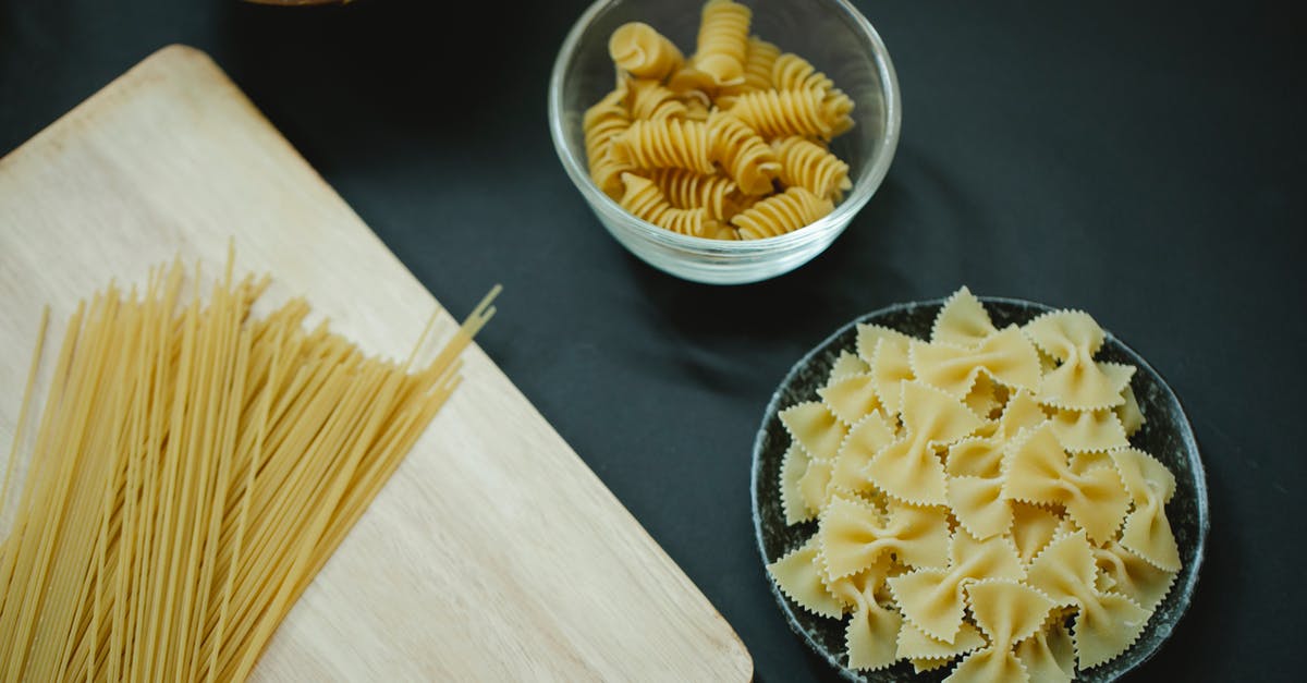 What is: Yellow Flour? - Different types of Italian pasta on table What is: Yellow Flour? - Different types of Italian pasta on table