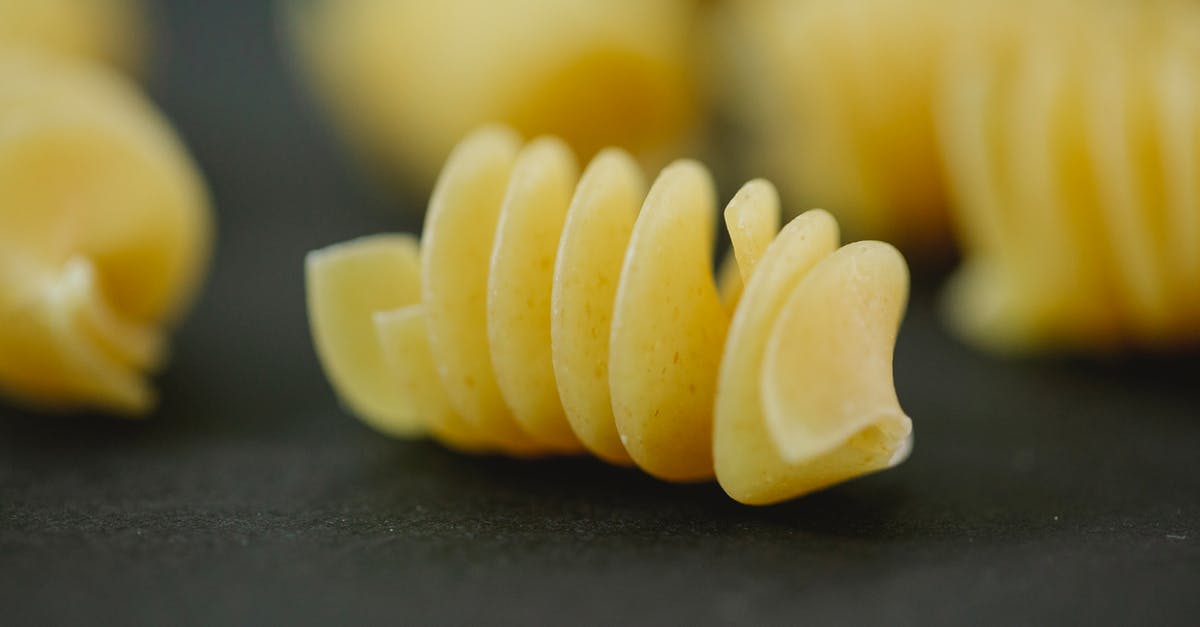 What is: Yellow Flour? - Closeup of fresh dried yellow fusilli pasta made with traditional Italian dough recipe What is: Yellow Flour? - Closeup of fresh dried yellow fusilli pasta made with traditional Italian dough recipe