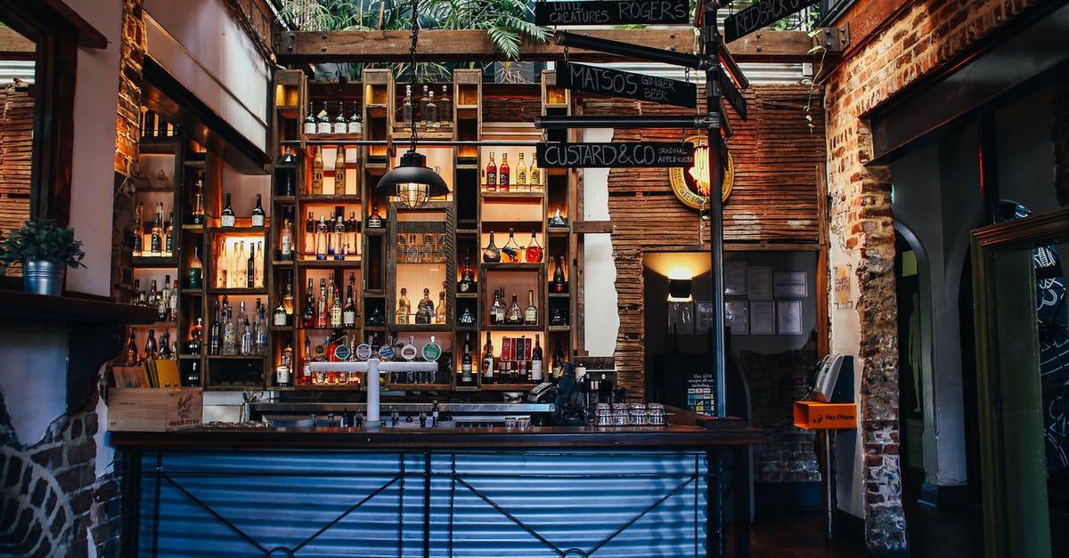 What kind of alcohol has least carbohydrates? - Brown Wooden Table and Chairs