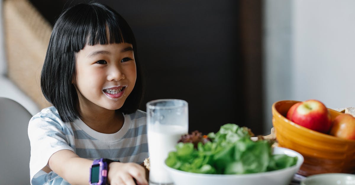 What kind of apple fermented drink did I just make? - Happy Asian girl drinking milk What kind of apple fermented drink did I just make? - Happy Asian girl drinking milk