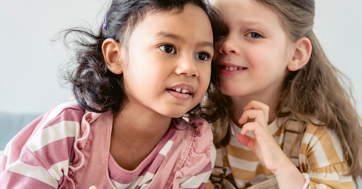 What kind of bread lasts long? - Smiling little Hispanic girl with brown eyes near cute best friend with long hair What kind of bread lasts long? - Smiling little Hispanic girl with brown eyes near cute best friend with long hair