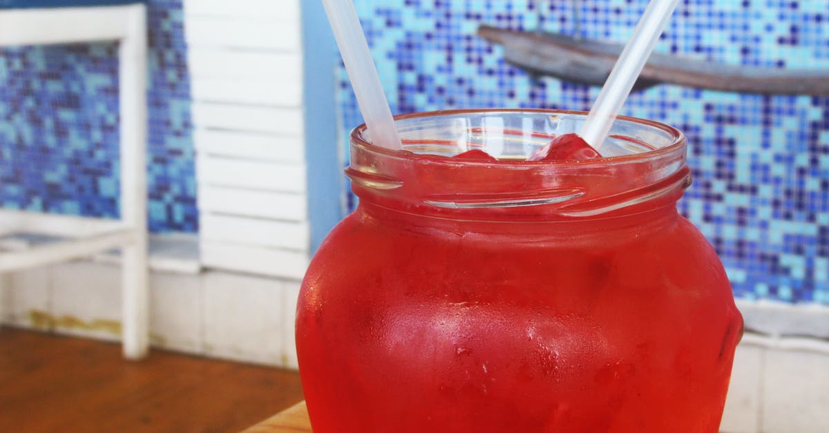 What kind of containers for homemade ice cream? - Red Beverage on Clear Glass Dispenser