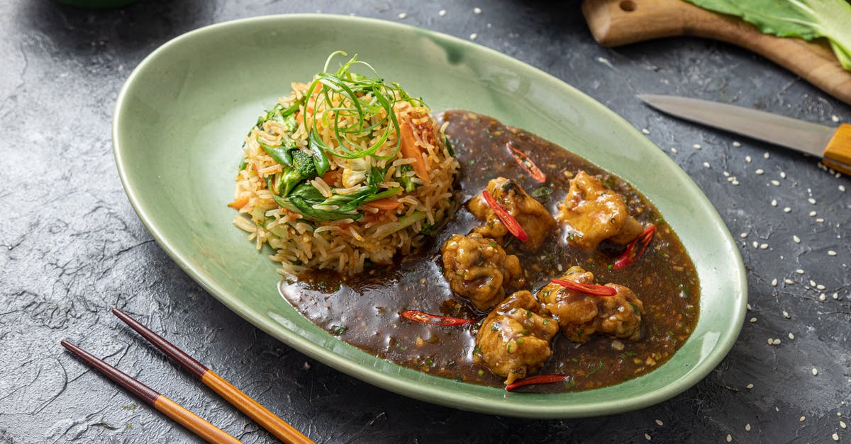What kind of rice is used in Chinese cooking? - Rice Meal with Brown Sauce on Oval Plate What kind of rice is used in Chinese cooking? - Rice Meal with Brown Sauce on Oval Plate