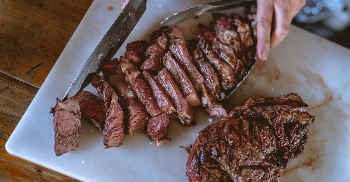 What kind of steak to use for fajitas? - Close-Up Shot of a Person Slicing Cooked Meat What kind of steak to use for fajitas? - Close-Up Shot of a Person Slicing Cooked Meat