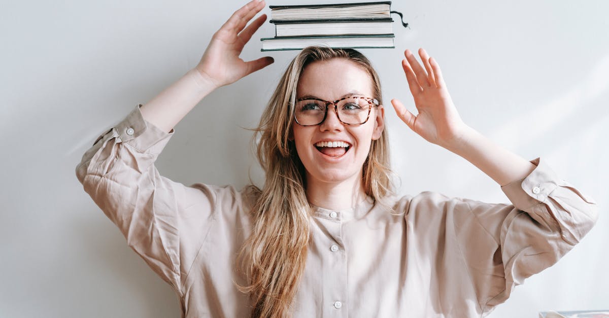 What kind of wok do I have? - Happy student with heap of books on head What kind of wok do I have? - Happy student with heap of books on head