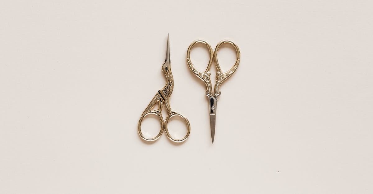 What makes fleur de sel different from regular salt? - Top view composition of scissors of various shape with carved ornament on beige table What makes fleur de sel different from regular salt? - Top view composition of scissors of various shape with carved ornament on beige table