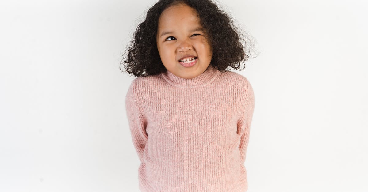 What makes sous vide brisket tender? - Cool black girl grimacing in studio What makes sous vide brisket tender? - Cool black girl grimacing in studio