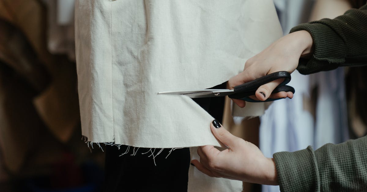 what material should i use for cutting board? - Person Holding Black Pen and White Paper