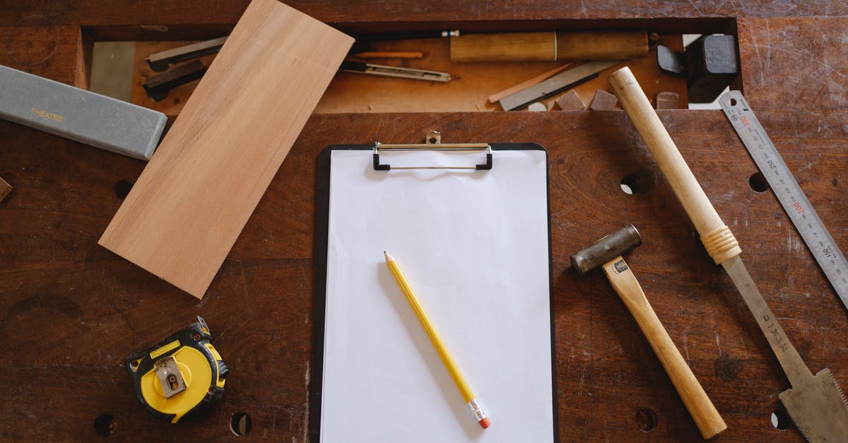 What materials would work for a waffle iron? - Yellow Pencil on White Paper And Carpentry Tools