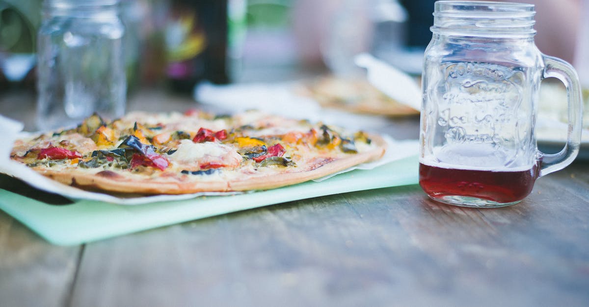 What oil to use when cooking a salmon? - Pizza on Green Chopping Board Near Two Clear Glass Mugs What oil to use when cooking a salmon? - Pizza on Green Chopping Board Near Two Clear Glass Mugs