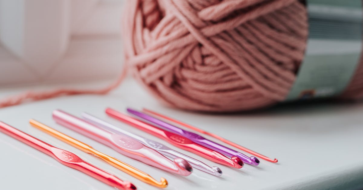 What setting on a thermomix would create a simmer? - Closeup of row of multicolored crochet needles and ball of beige threads for knitting in bright room What setting on a thermomix would create a simmer? - Closeup of row of multicolored crochet needles and ball of beige threads for knitting in bright room