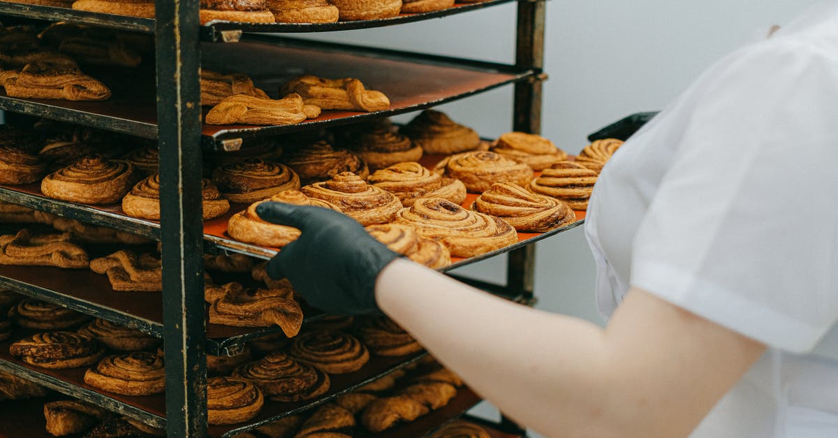 What takes over the functions of gluten in gluten-free bread mixes? - Photo of a Person Taking Out a Tray of Cinnamon Rolls What takes over the functions of gluten in gluten-free bread mixes? - Photo of a Person Taking Out a Tray of Cinnamon Rolls