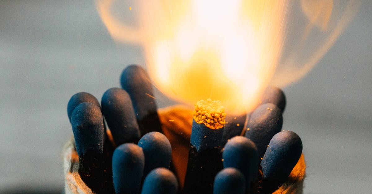 What temperature is the "warm" setting on a conventional oven? - Closeup of burning fire on match head among pile of black matches in jar on blurred background What temperature is the "warm" setting on a conventional oven? - Closeup of burning fire on match head among pile of black matches in jar on blurred background