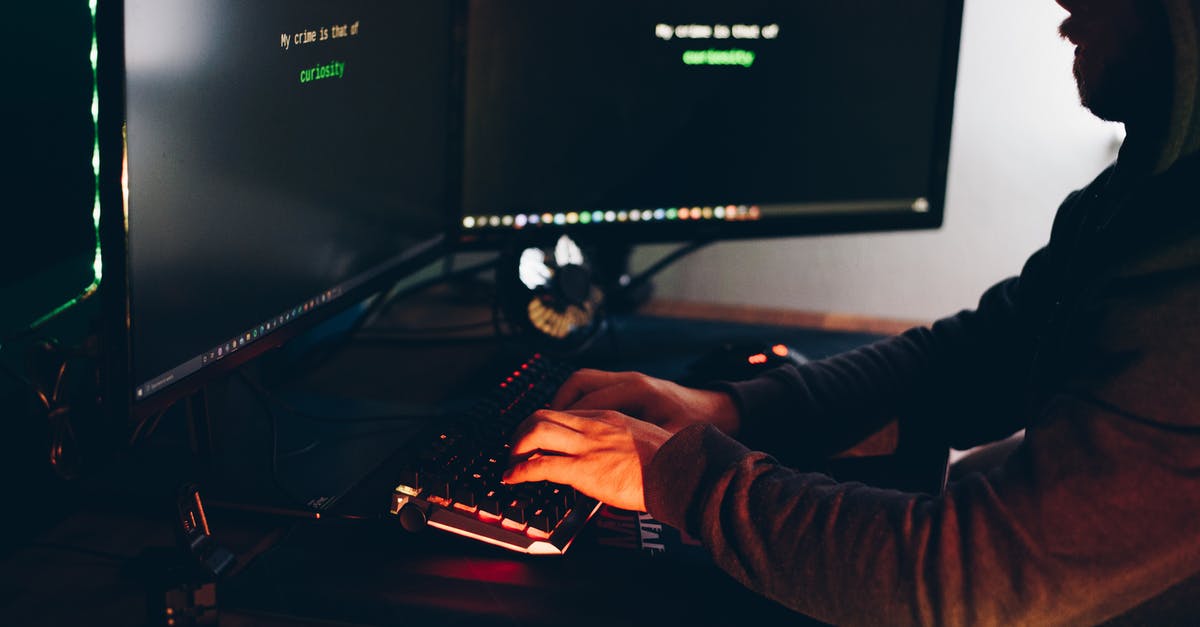 What tempering process do you use when moulding chocolates - Crop hacker silhouette typing on computer keyboard while hacking system What tempering process do you use when moulding chocolates - Crop hacker silhouette typing on computer keyboard while hacking system
