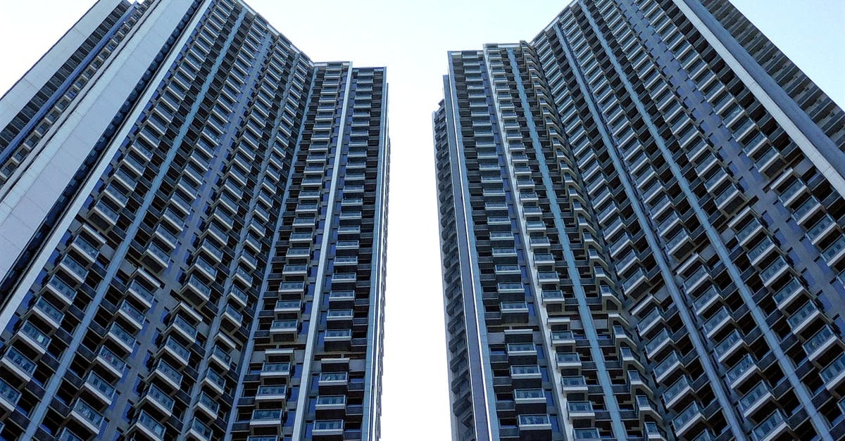 What to add if low-carb muffins don't rise and are crumbly - From below of similar contemporary high rise residential buildings with balconies under blue sky What to add if low-carb muffins don't rise and are crumbly - From below of similar contemporary high rise residential buildings with balconies under blue sky
