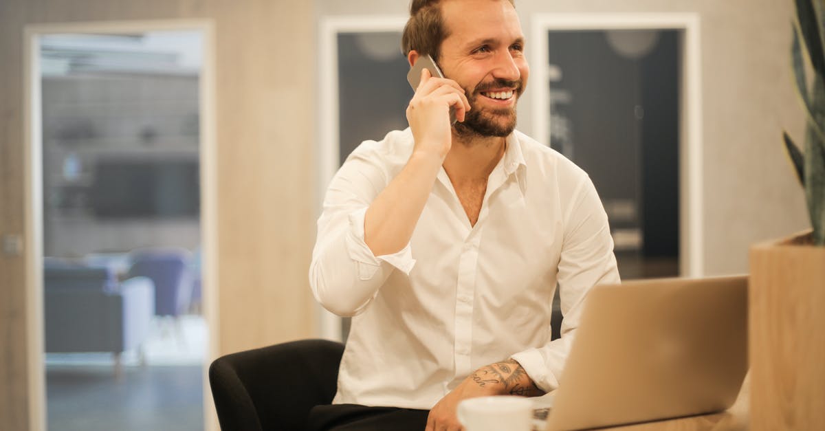What to call this utensil - Smiling formal male with laptop chatting via phone What to call this utensil - Smiling formal male with laptop chatting via phone