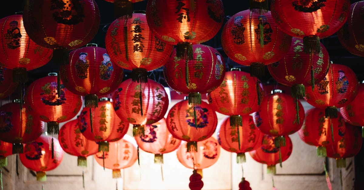 What to do with left-over rices from Chinese takeouts? - From below of many red rice paper lanterns with golden hieroglyphs hanging on street during celebration of Chinese Spring Festival What to do with left-over rices from Chinese takeouts? - From below of many red rice paper lanterns with golden hieroglyphs hanging on street during celebration of Chinese Spring Festival