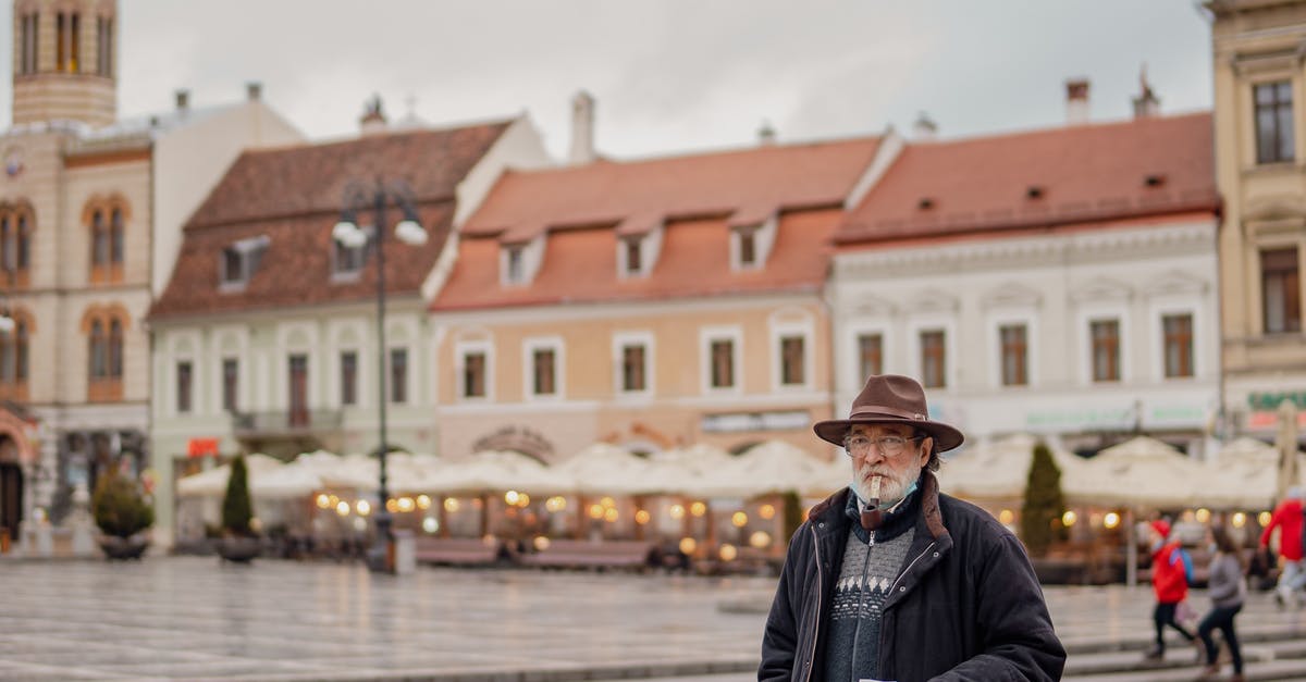 What to do with old coffee beans? - Man in Black Jacket and Black Pants Standing on Sidewalk What to do with old coffee beans? - Man in Black Jacket and Black Pants Standing on Sidewalk