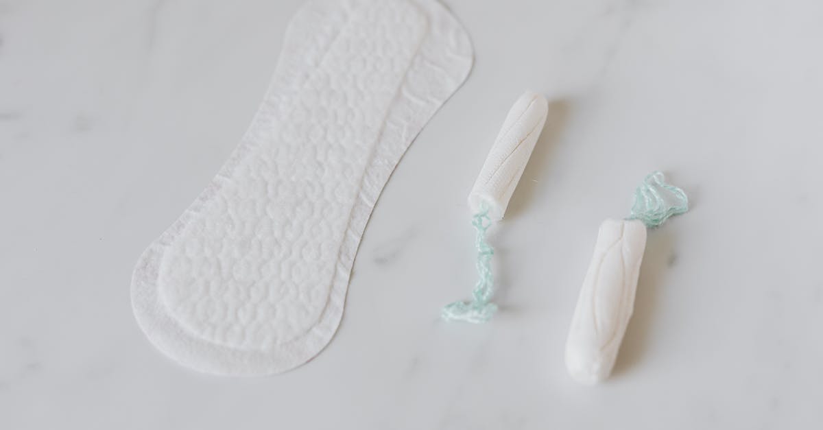 What to do with unused scallops' roe? - Tampons and daily liner on white surface What to do with unused scallops' roe? - Tampons and daily liner on white surface