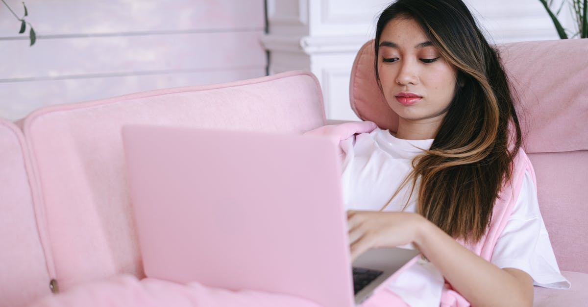 What to look for in a pot? - Woman in White Shirt Reclining on Pink Sofa