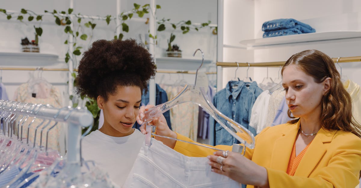 What to look for when choosing a dutch oven? - Women Looking at a White Pants Inside a Boutique What to look for when choosing a dutch oven? - Women Looking at a White Pants Inside a Boutique