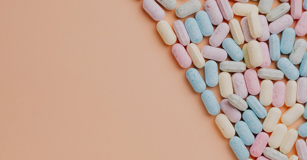 what to mix with milk other than sugar to give good taste [closed] - Pile of various drops on pink background