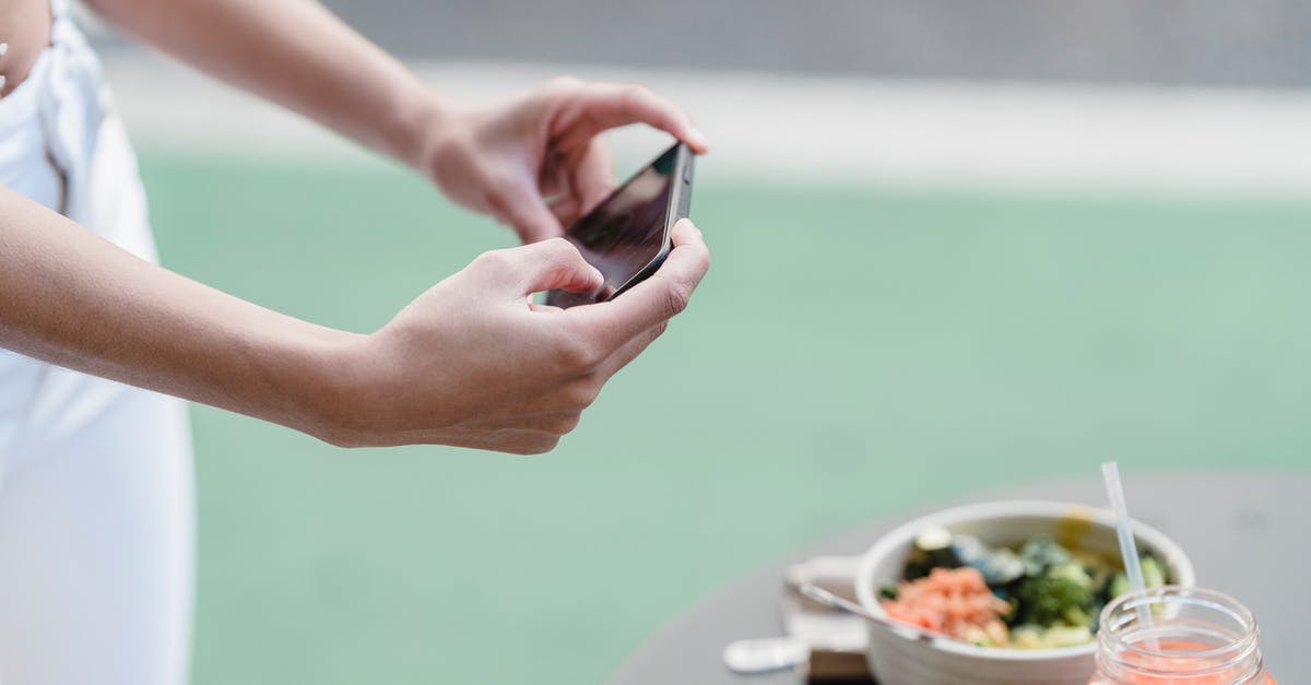 What vegetarian substitute for prosciutto could I use in Carbonara? - Crop unrecognizable female blogger taking photo of vegetable salad and smoothie on cellphone in street cafeteria