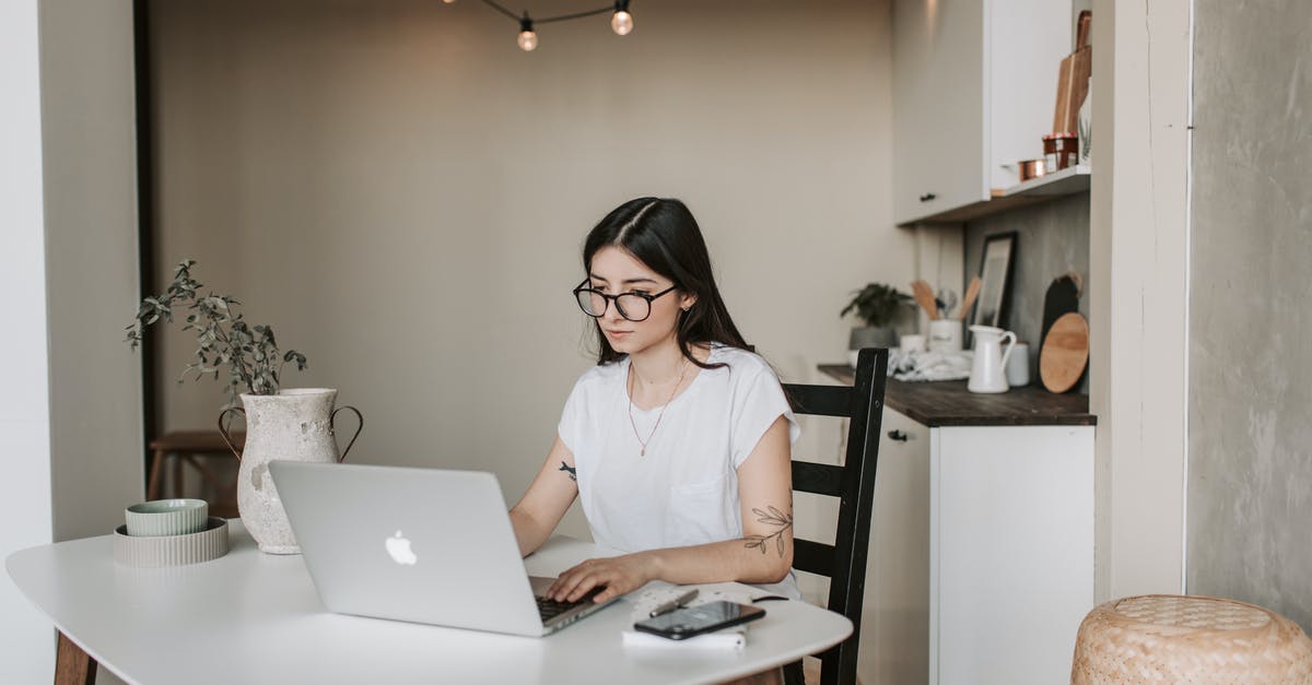 What was wrong with using White Truffle Oil? - Focused young businesswoman using laptop at home What was wrong with using White Truffle Oil? - Focused young businesswoman using laptop at home